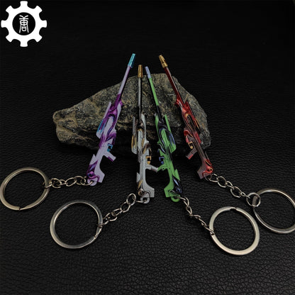 Metal Tilde Operator Gun Tiny Keychain Pendant
