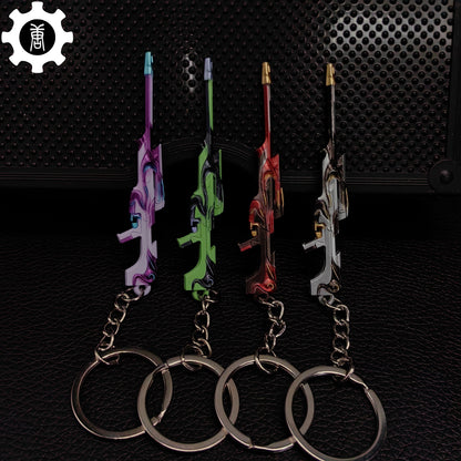 Metal Tilde Operator Gun Tiny Keychain Pendant